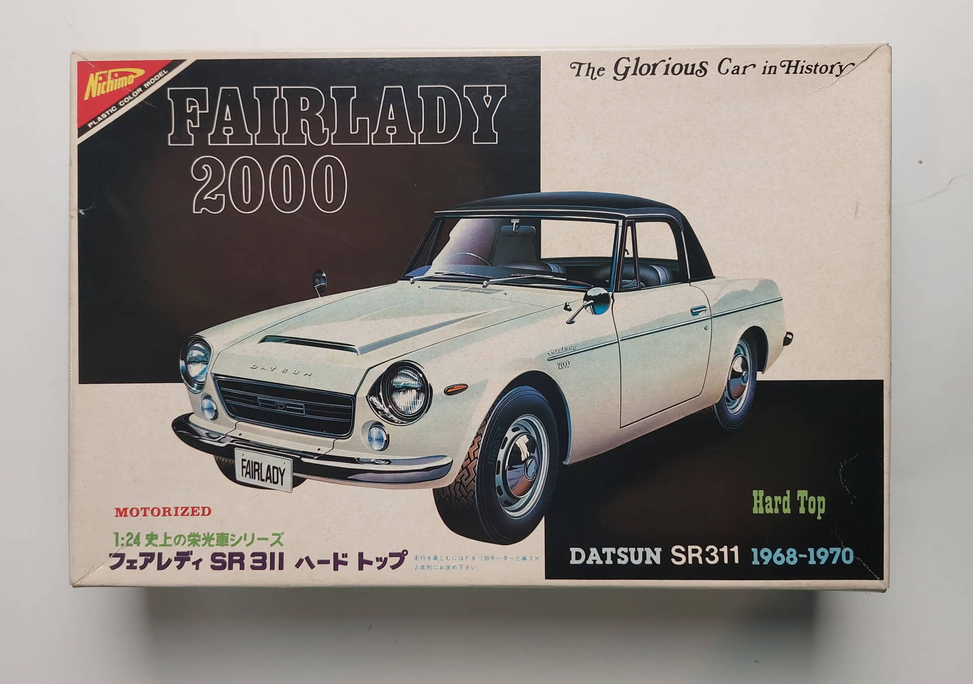 cbb356c857ffc0ca8472436ff30fde0a.jpg 1/24 Datsun Fairlady 2000 SR 311 Hard Top 1968-1970 Сборная модель Nichimo HC-2405