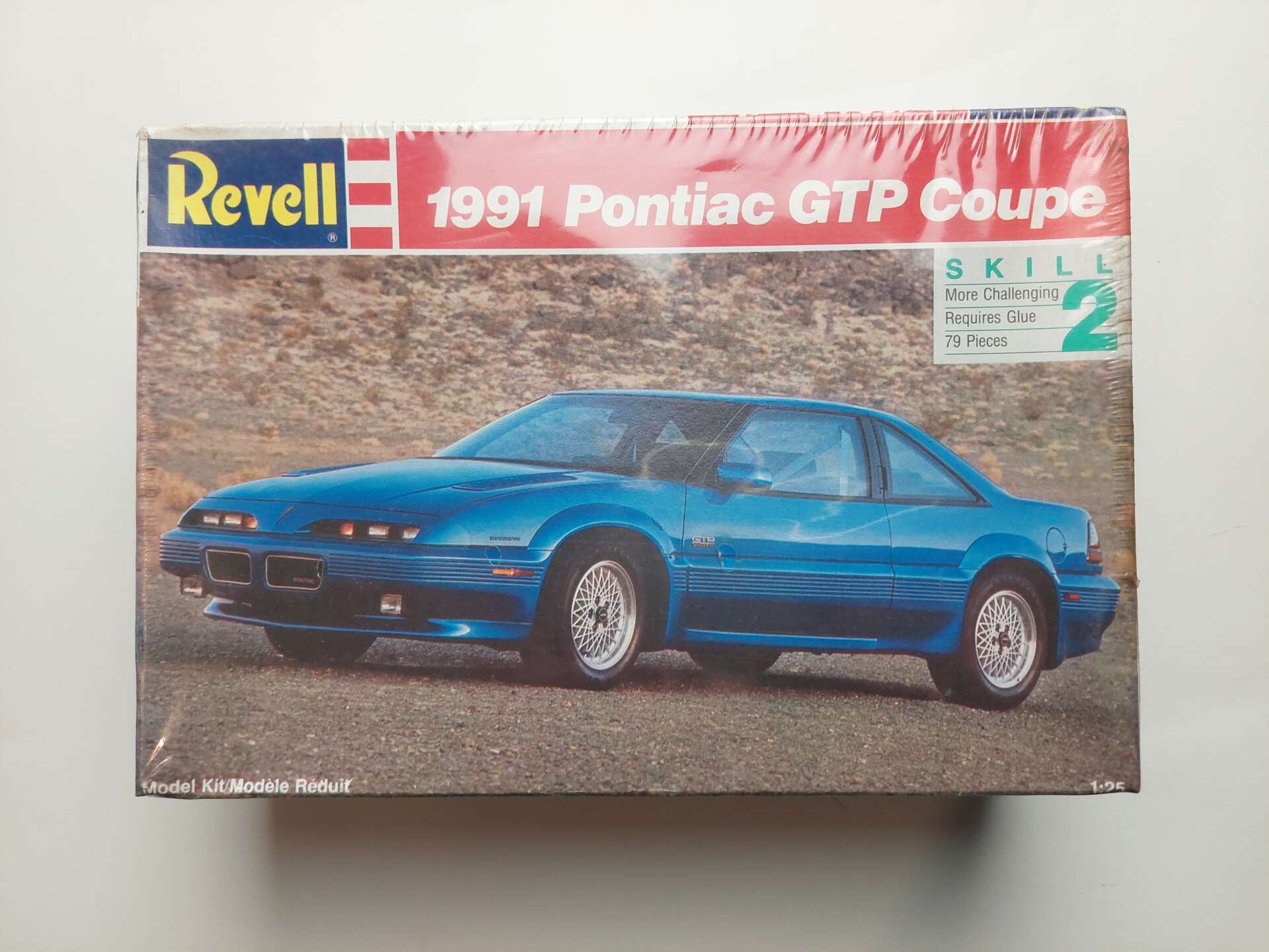 230dc4833085a53bfb34109e58bb6270.jpg 1/25 Pontiac GTP 1991 Coupe Сборная модель Revell 7433