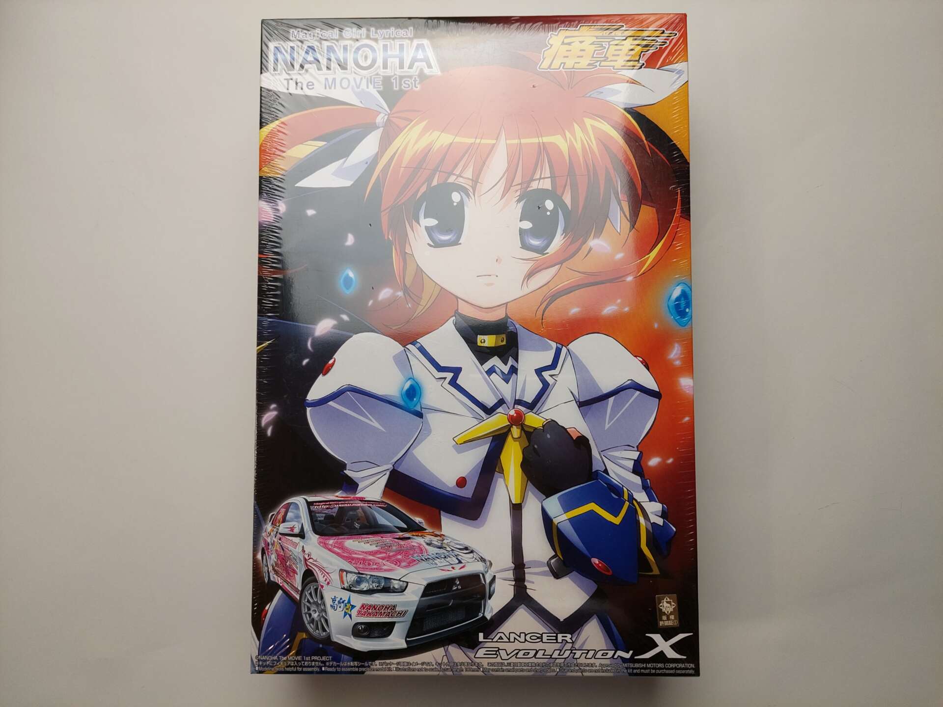 60e351c5a0c9400ae4d4f15d6b84b34d.jpg 1/24 Mitsubishi Lancer Evo X Magical Girl Lyrical Nanoha The Movie 1st - Nanoha Сборная модель Aoshima 049693
