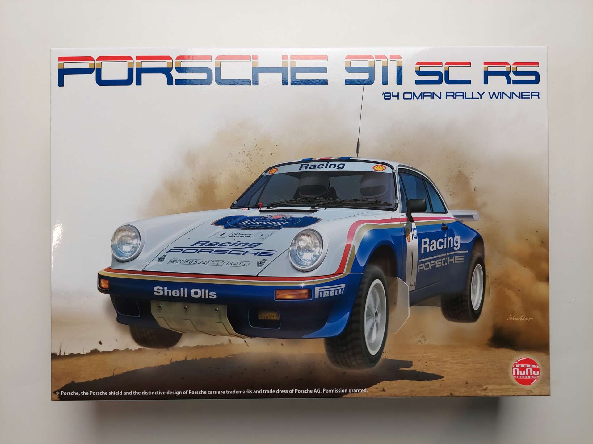 9273560334530a7e1c66df882e888ee1.jpg 1/24 Porsche 911 SC RS '84 Oman Rally Winner #1 Сборная модель NuNu PN24011